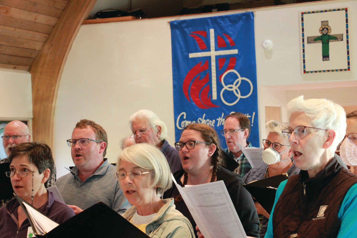 Members of the RainShadow Chorale rehearse for their upcoming concert, ‘The Seal Lullaby.”